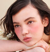 Piper wears Airblush in Doll