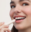 Jade wears Lip Treat in Sakura