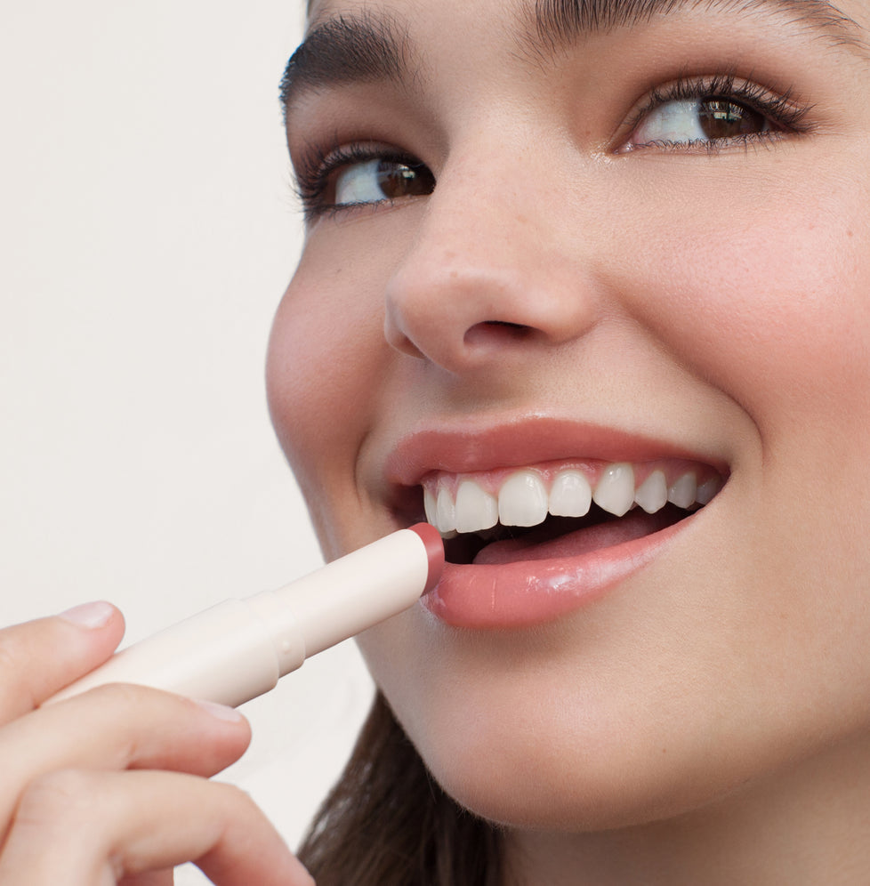 Jade wears Lip Treat in Sakura