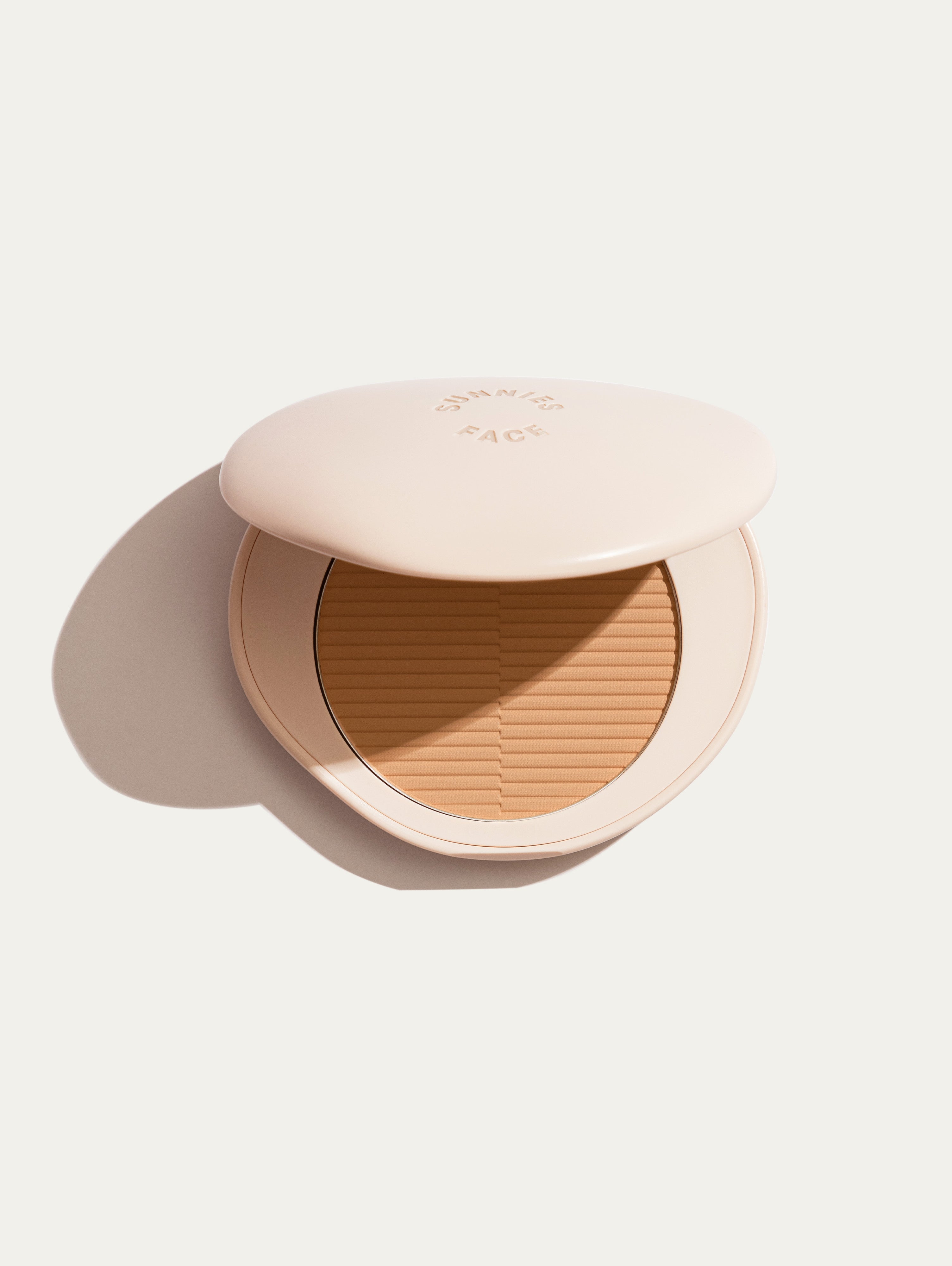 Faces compact online powder